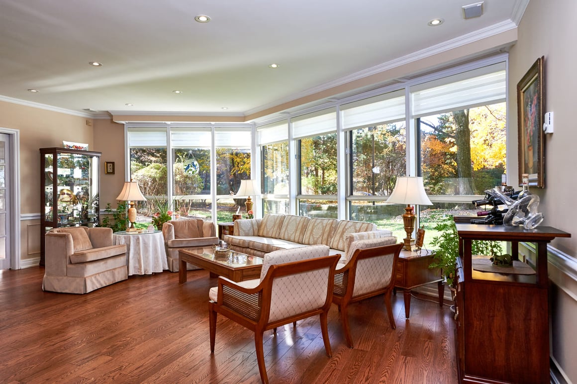 Family room area in Toronto condo renovation with floor-to-ceiling windows