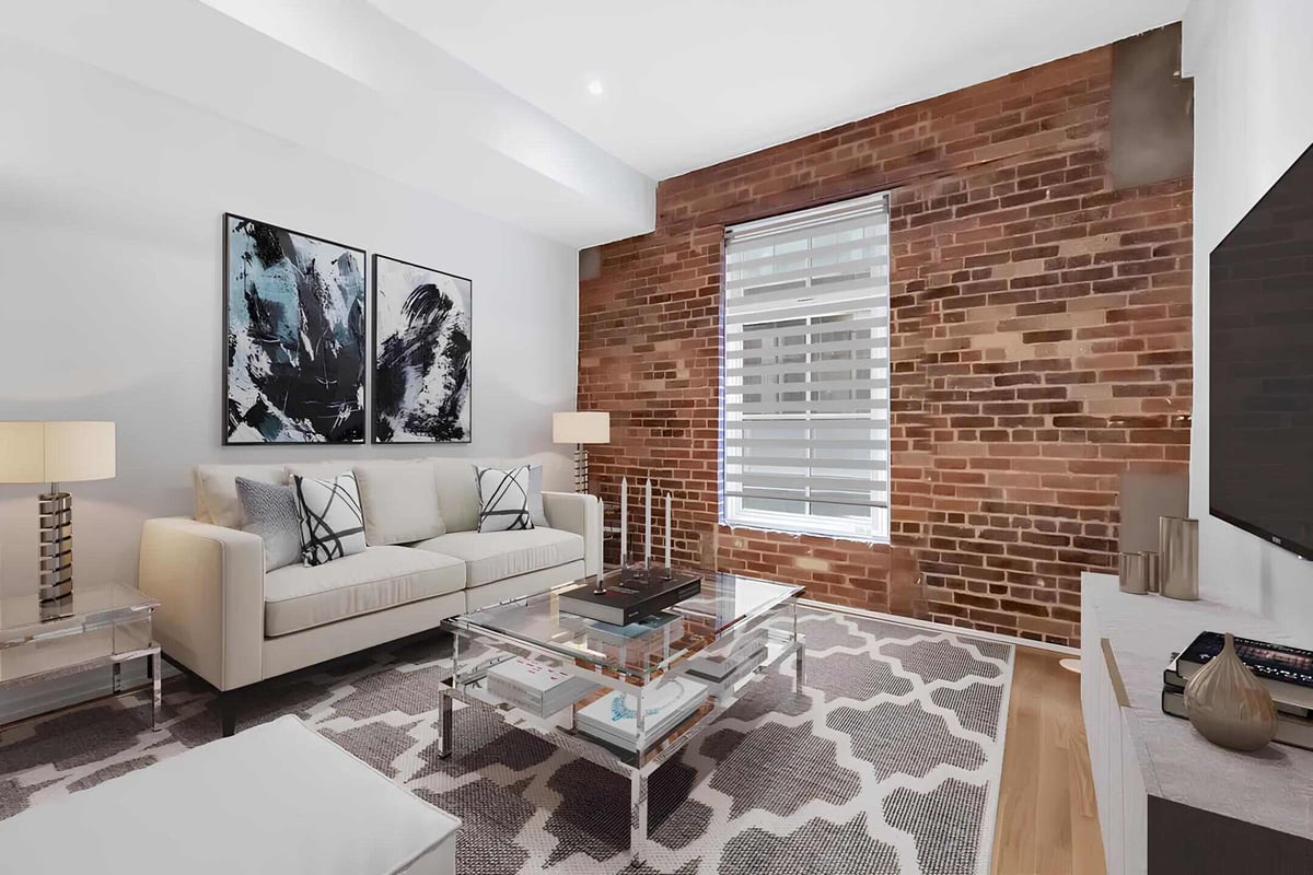 Living room in Toronto condo renovation by Golden Bee Condos