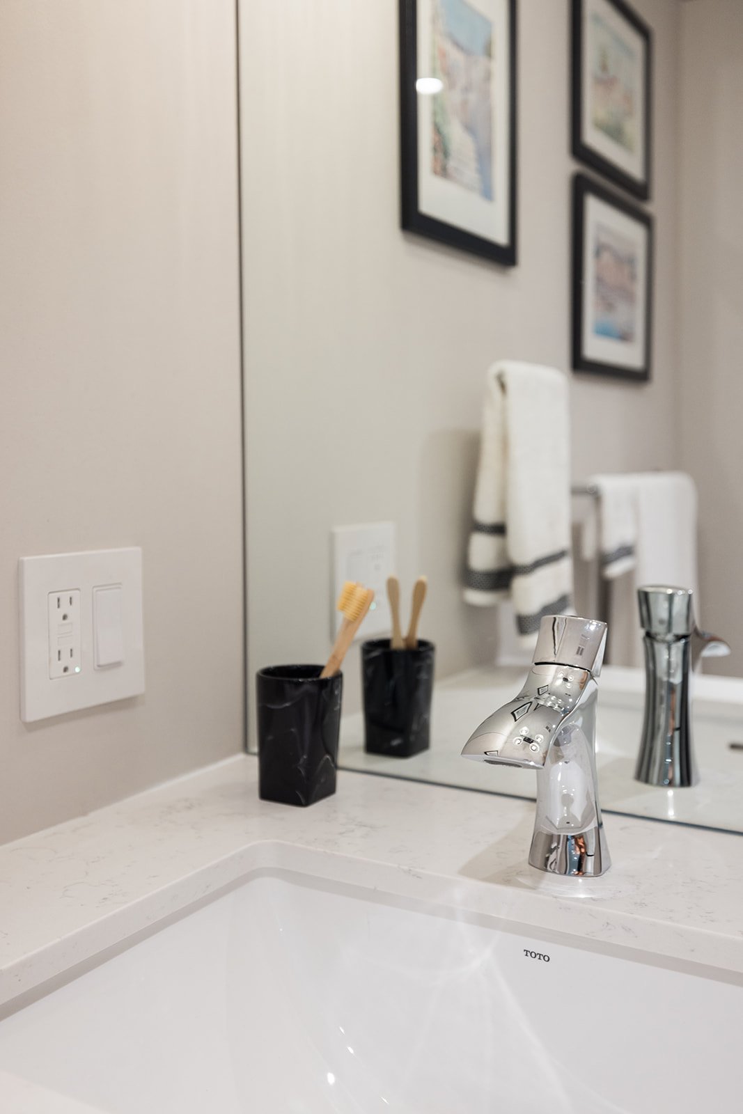 Bathroom vanity details with stainless steel faucet in GTA condo bathroom renovation