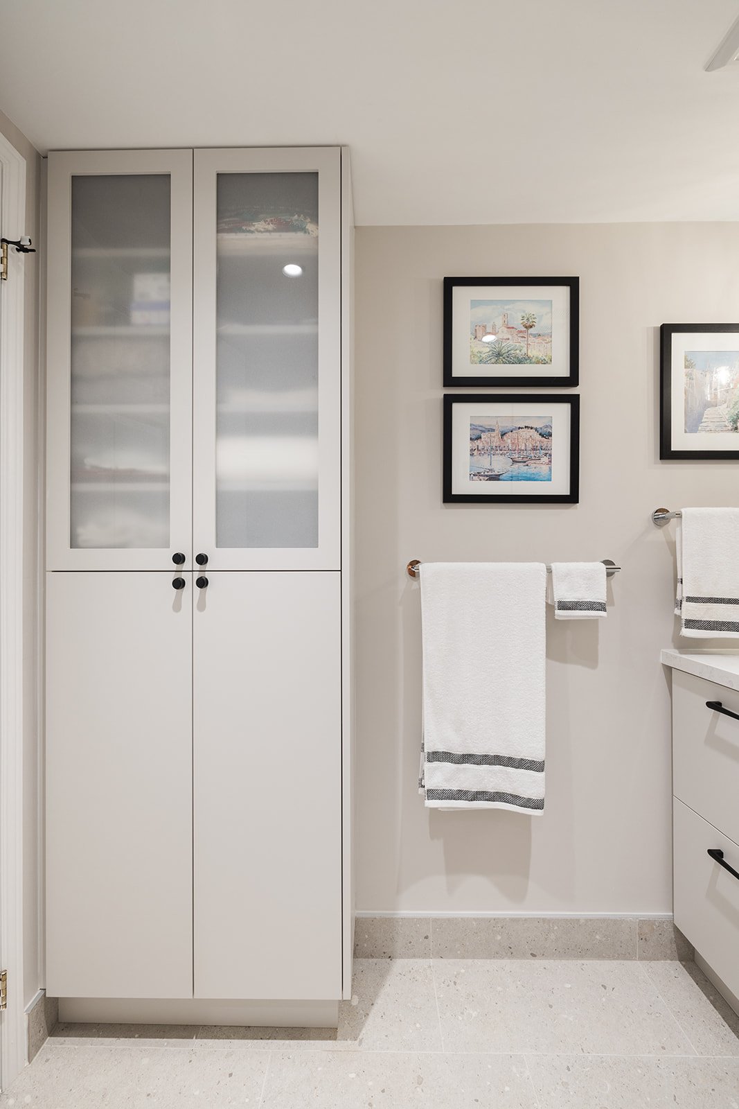 Custom towel storage and towel rack in GTA condo renovation by Golden Bee Condos