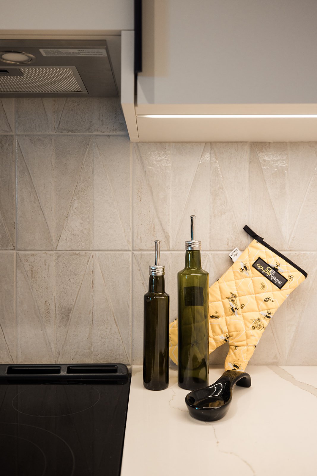 Detail of mosaic backsplash in GTA luxury condo kitchen renovation