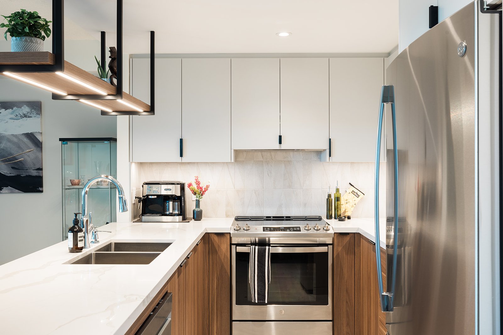 GTA condo kitchen renovation with flat panel two tone cabinets by Golden Bee Condos