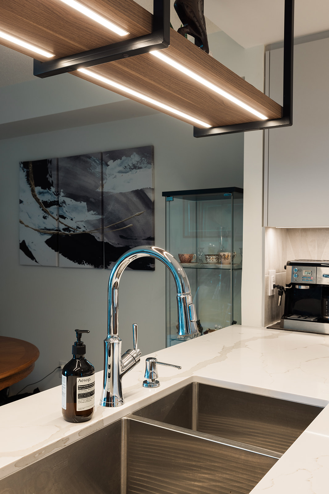 Hanging light fixture above sink in GTA condo kitchen renovation