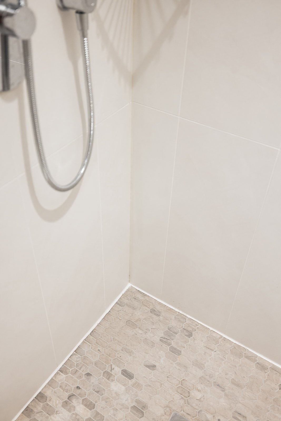 Shower floor tile details in Toronto bathroom renovation