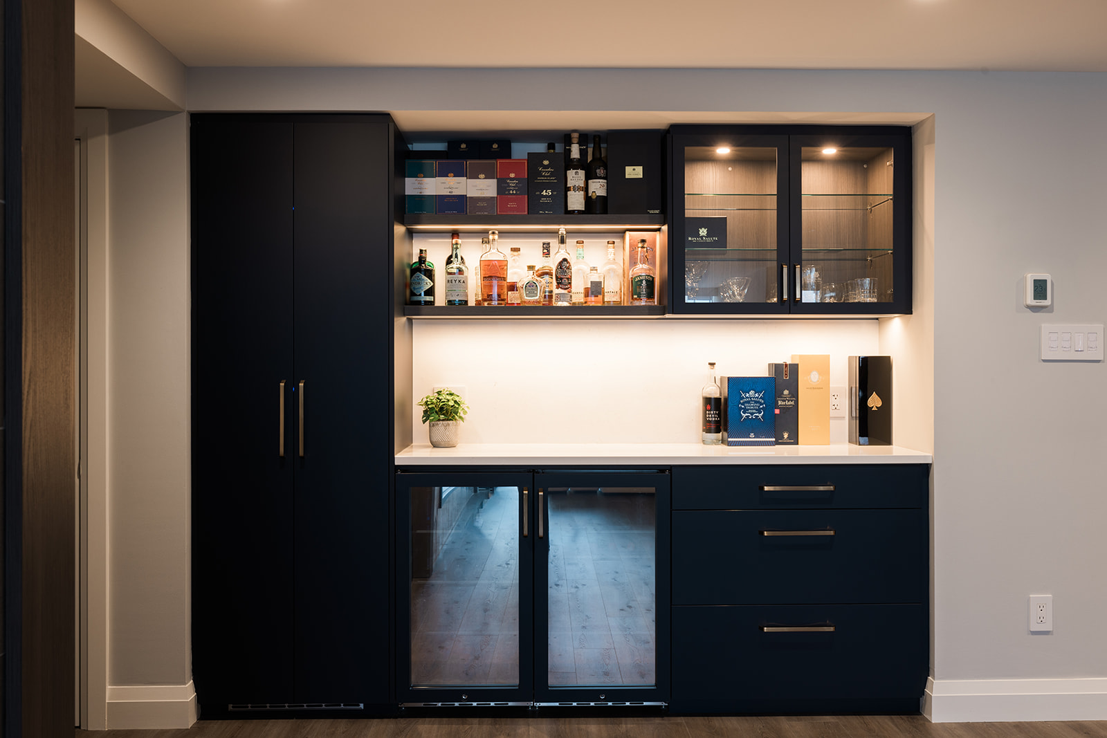 Downtown Toronto full condo renovation view of custom beverage station with task lighting by Golden Bee Condos