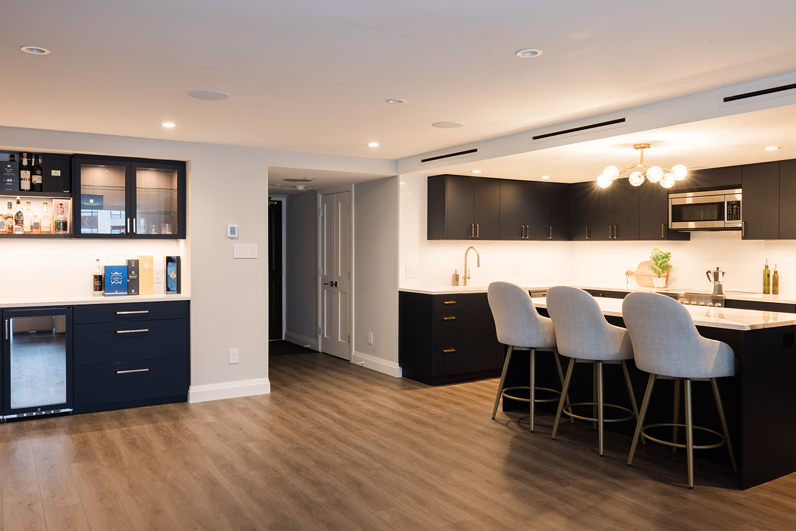 Full condo renovation with open-concept layout and kitchen island in downtown Toronto