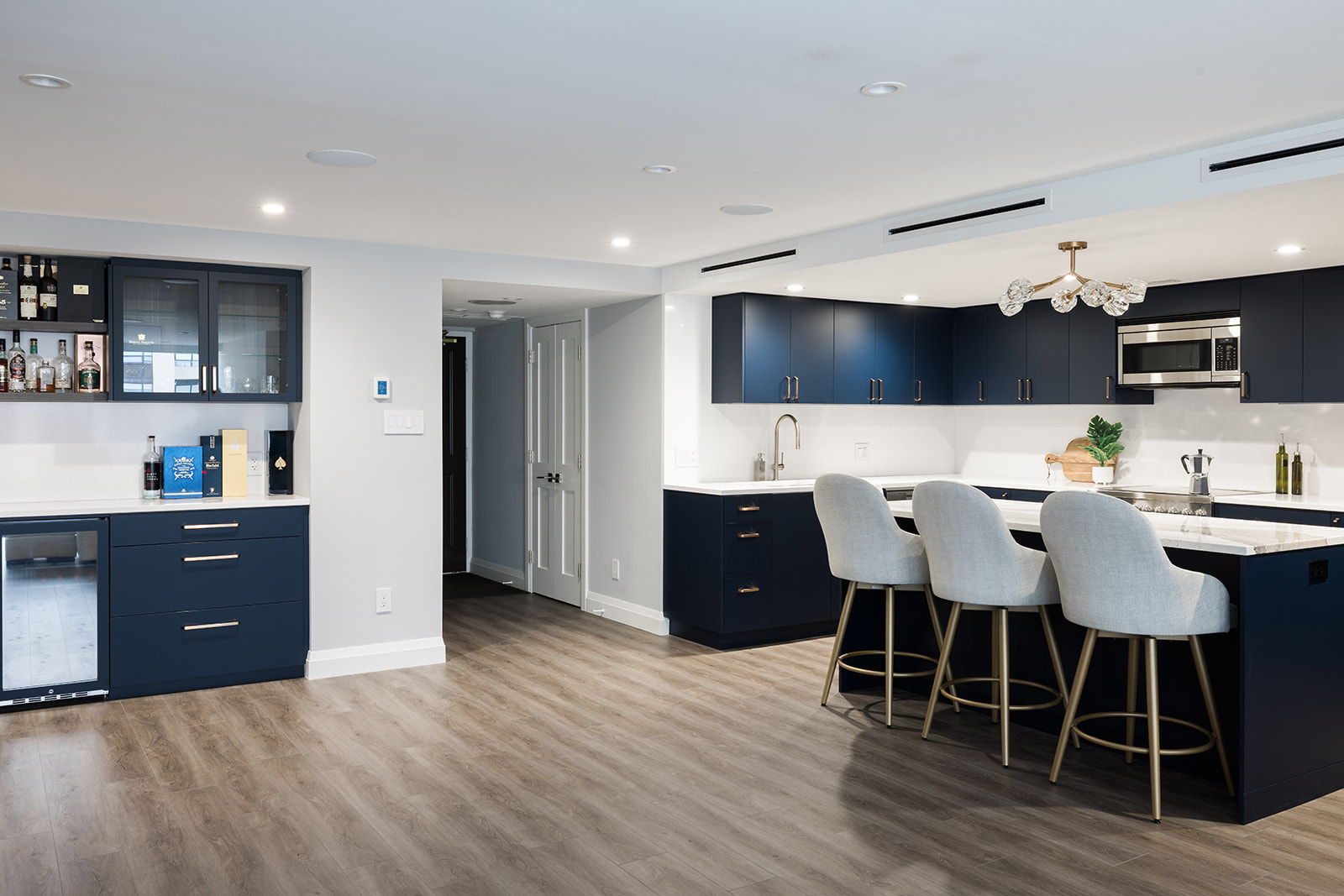 Luxury full condo renovation with open-concept layout and kitchen island in downtown Toronto