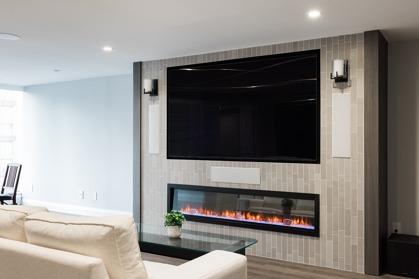 View of custom fireplace in living room in downtown Toronto condo renovation 