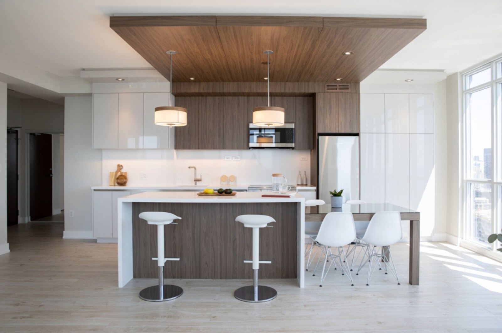 Wood accents in kitchen condo renovation in Toronto